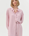 pink Striped button down shirt
Oversized
Center front placket
Classic shirt collar
Shirttail hem
pink oversized button down shirt
For love and lemons