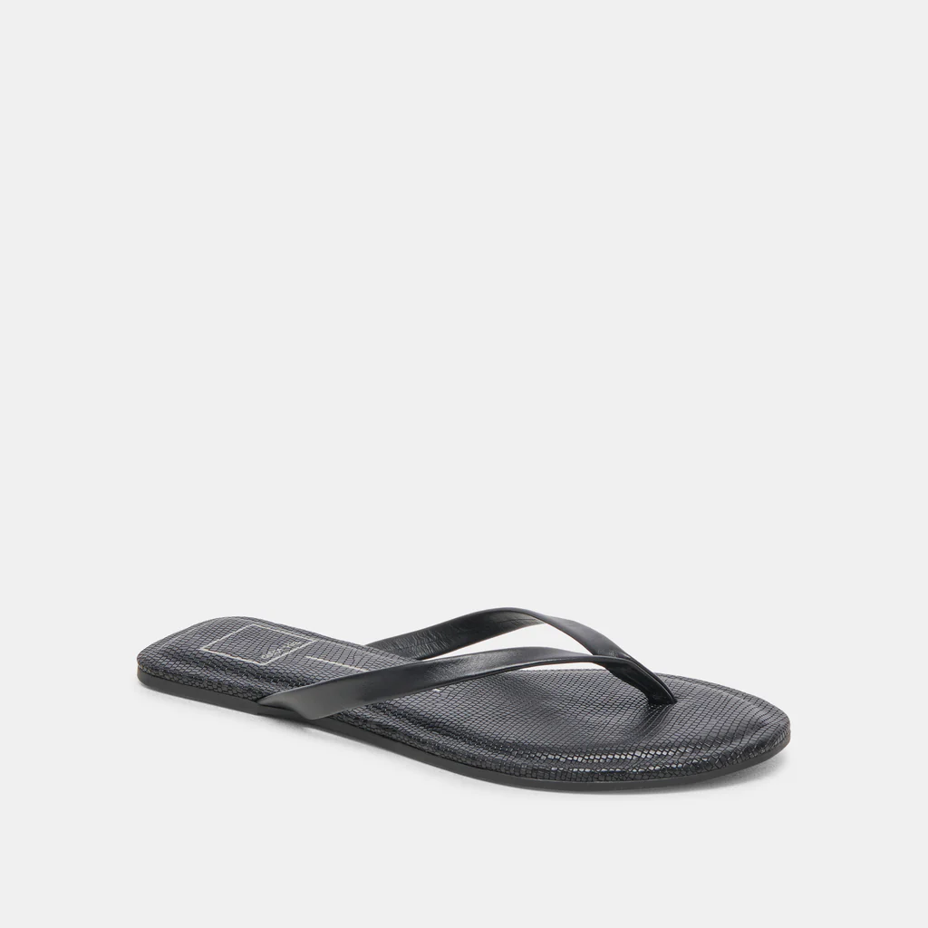 pared down and simplistic sandal adds a chic and effortless touch to your casual looks. Black sandal. Simple but cute sandal. Dolce Vita shoe. Dolce vita sandal. 