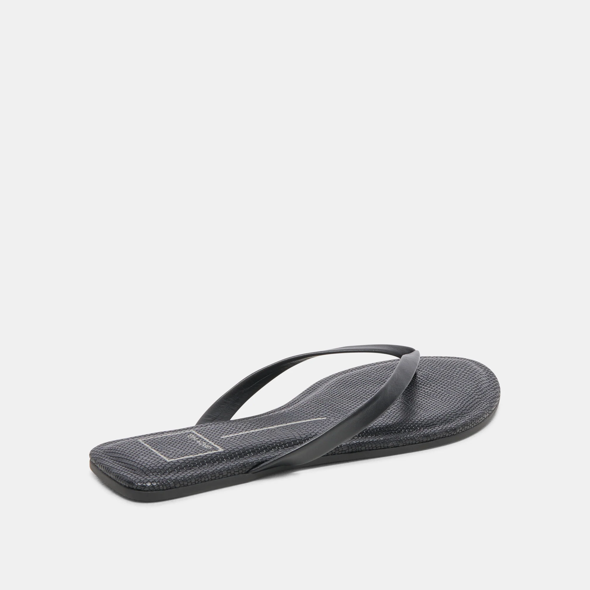 pared down and simplistic sandal adds a chic and effortless touch to your casual looks. Black sandal. Simple but cute sandal. Dolce Vita shoe. Dolce vita sandal. 