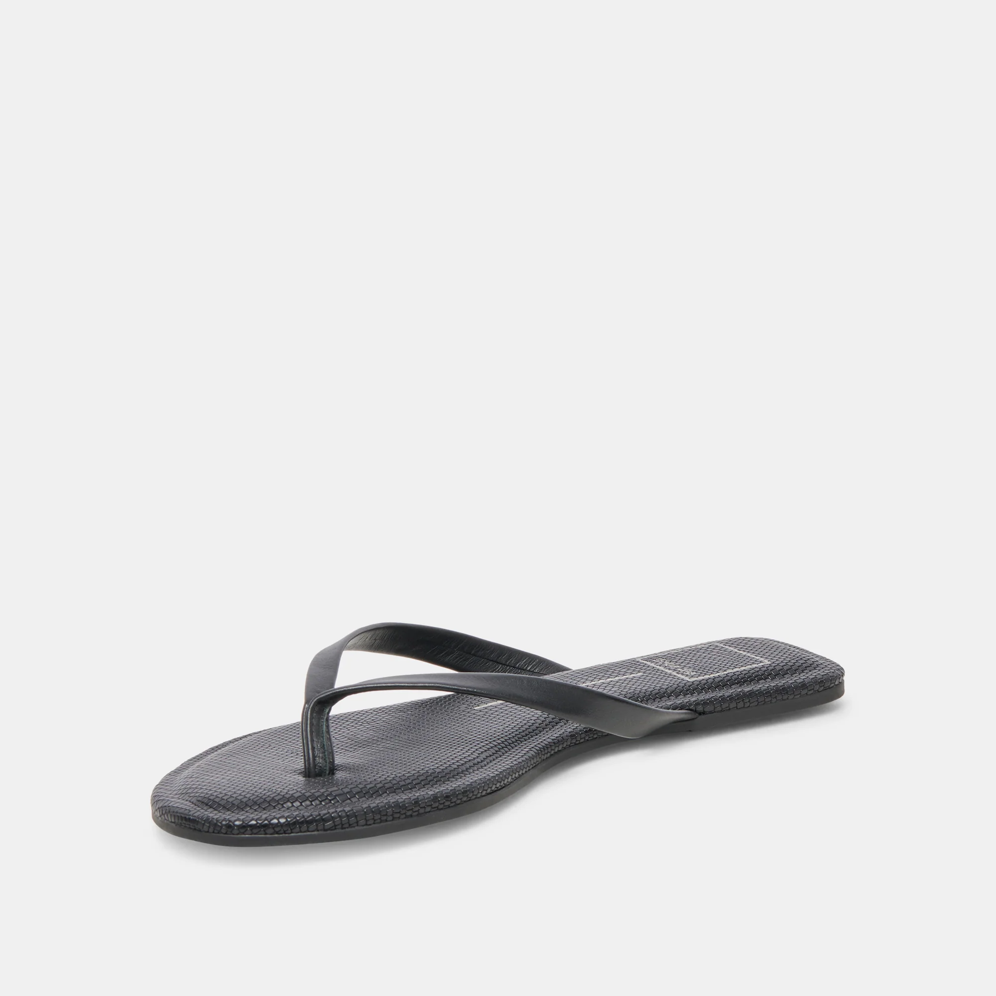 pared down and simplistic sandal adds a chic and effortless touch to your casual looks. Black sandal. Simple but cute sandal. Dolce Vita shoe. Dolce vita sandal. 