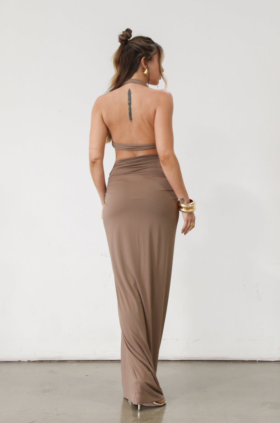 Knit maxi skirt. Knit top. Front keyhole with adjustable tie closure. Front slit. Fully lined. tan dress set. tan set to wear on vacation. Outfit to wear on vacation. Outfift to wear in Mexico. Mexico outfit. Beach outfit. brown dress set. brown set