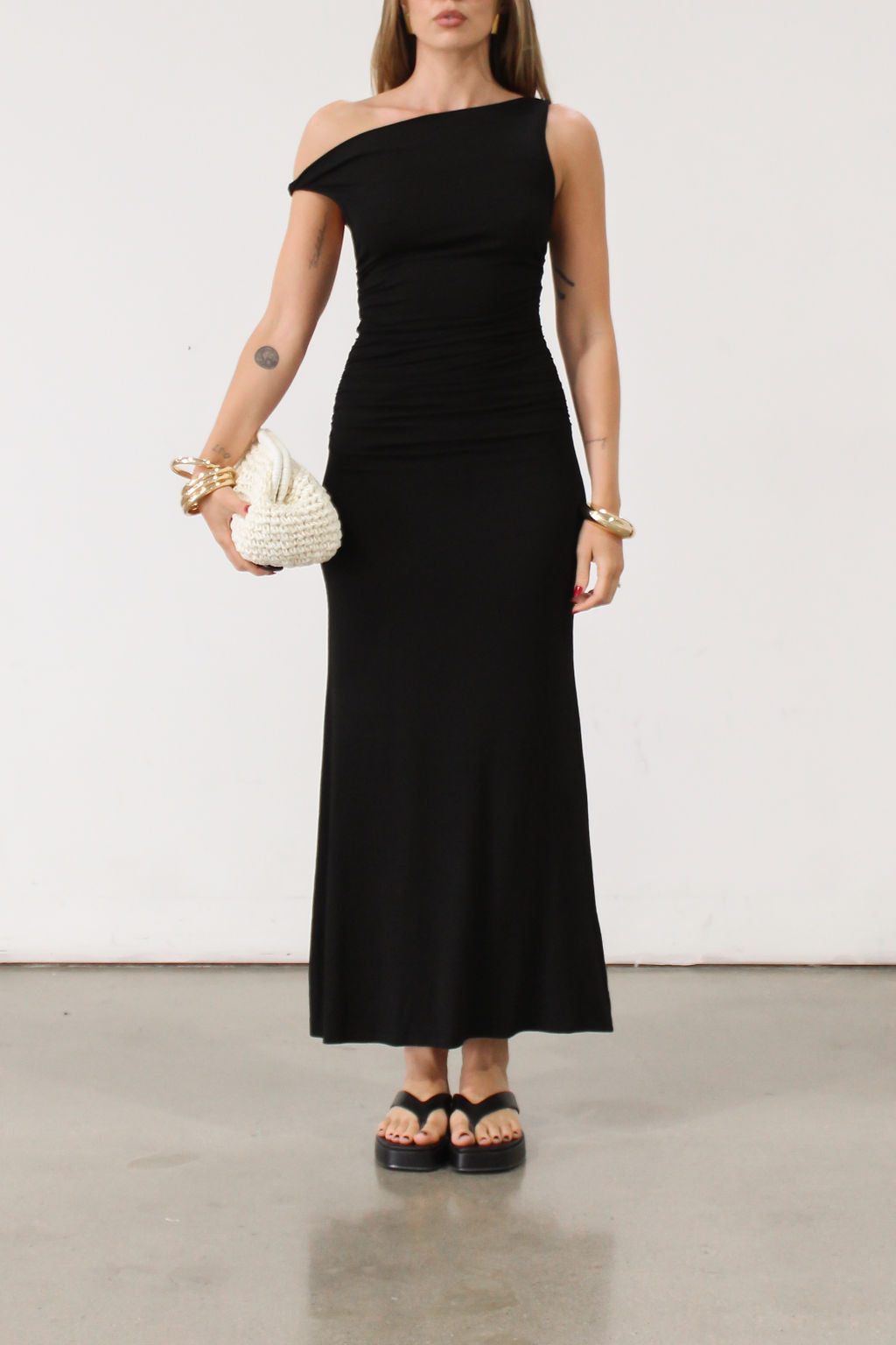 black Ribbed knit maxi dress. Twisted straps. Ruched sides. Unlined.