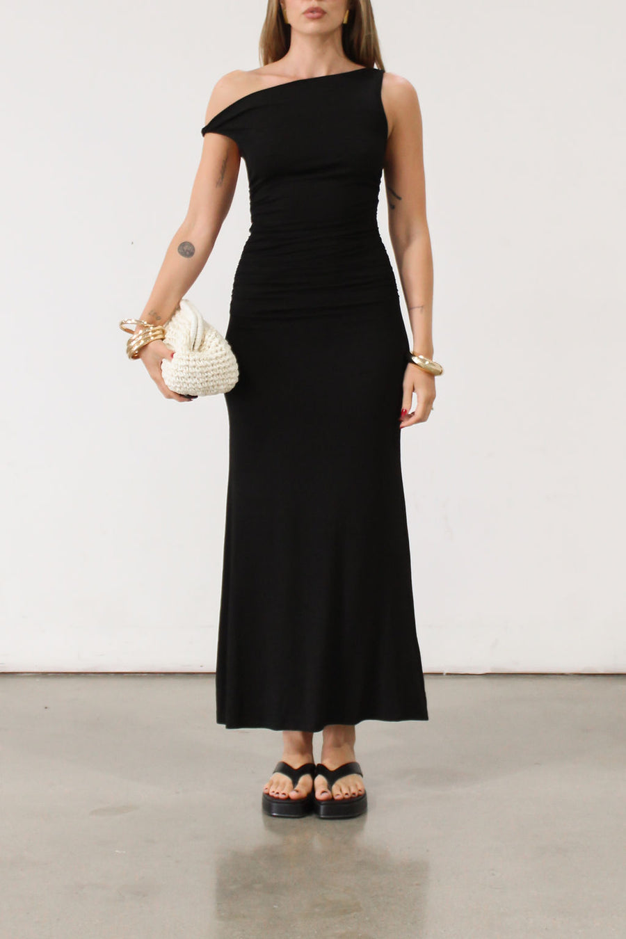 black Ribbed knit maxi dress. Twisted straps. Ruched sides. Unlined.