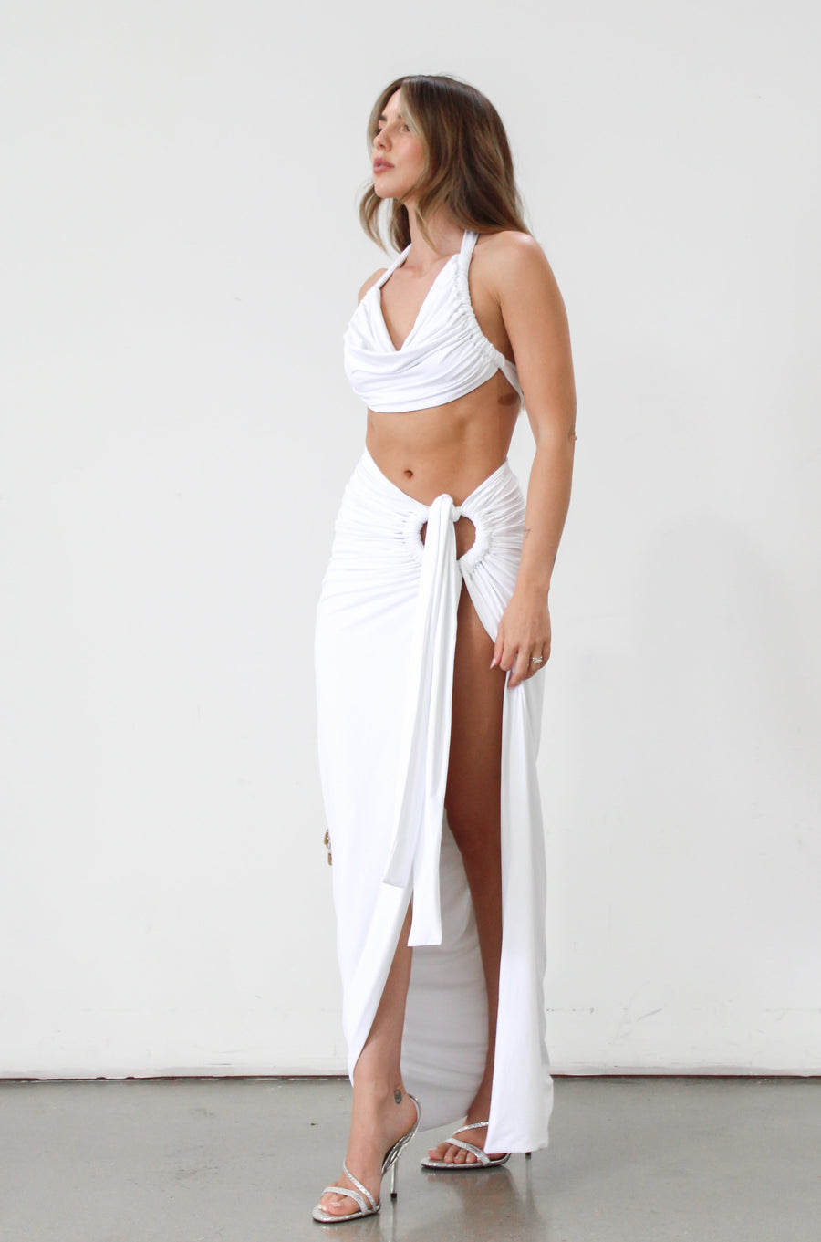 Knit maxi skirt. Knit top. Front keyhole with adjustable tie closure. Front slit. Fully lined. White dress set. White set to wear on vacation. Outfit to wear on vacation. Outfift to wear in Mexico. Mexico outfit. Beach outfit.