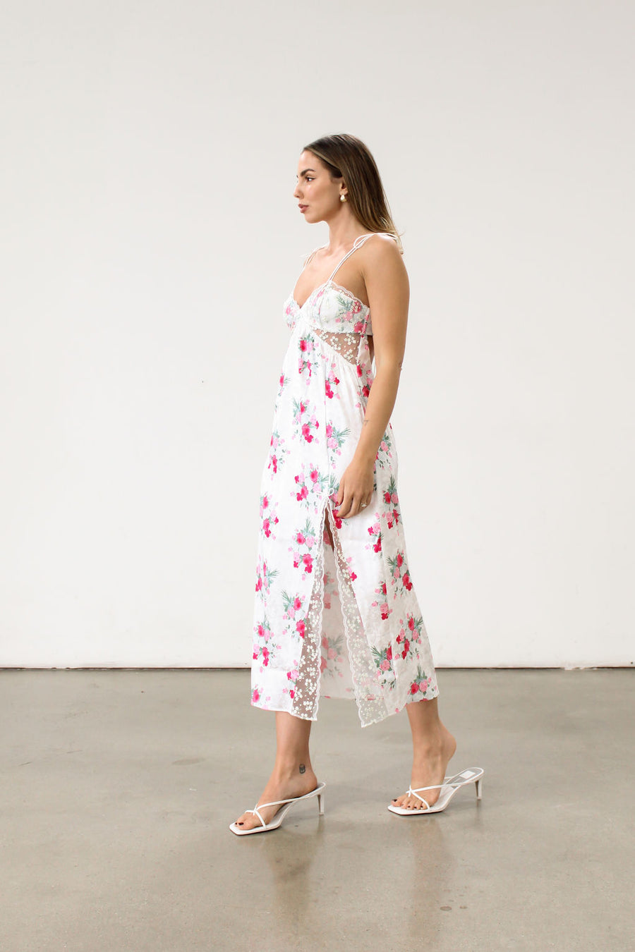 Floral printed satin maxi dress. Adjustable tie straps. Front slot. Adjustable back tie closures. Unlined for love and lemons dress. floral slip dress with lace detail and slit.