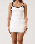 Ribbed knit dress. Elastic straps. Scoop back. Fully lined. Contrast.