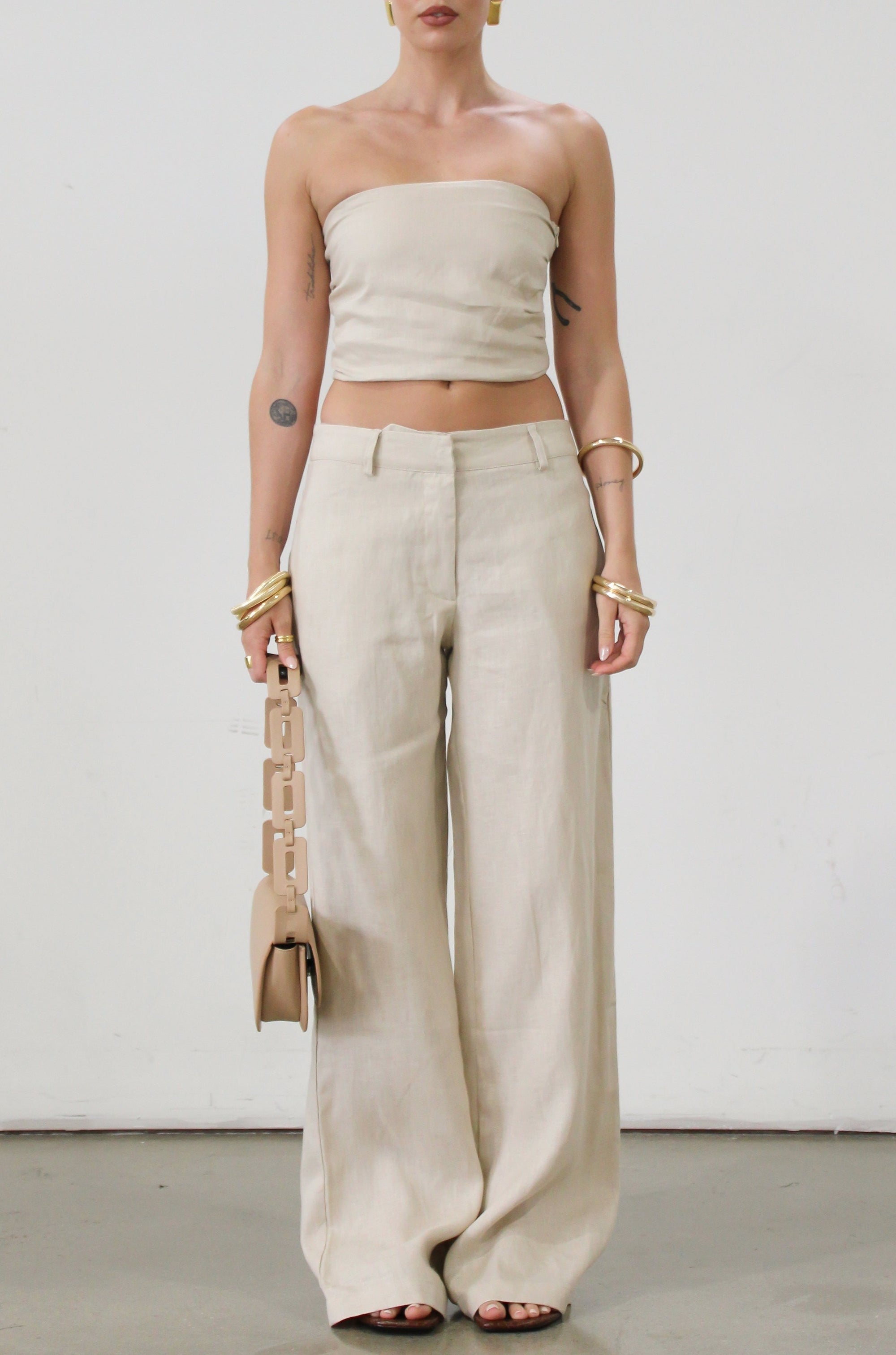 Woven wide leg pants. Hook and eye and zipper fly. Side pockets. Unlined.  tan linen pants. linen pants. everyday throw on pants. business causal pants. vacation set. vacation outfit.