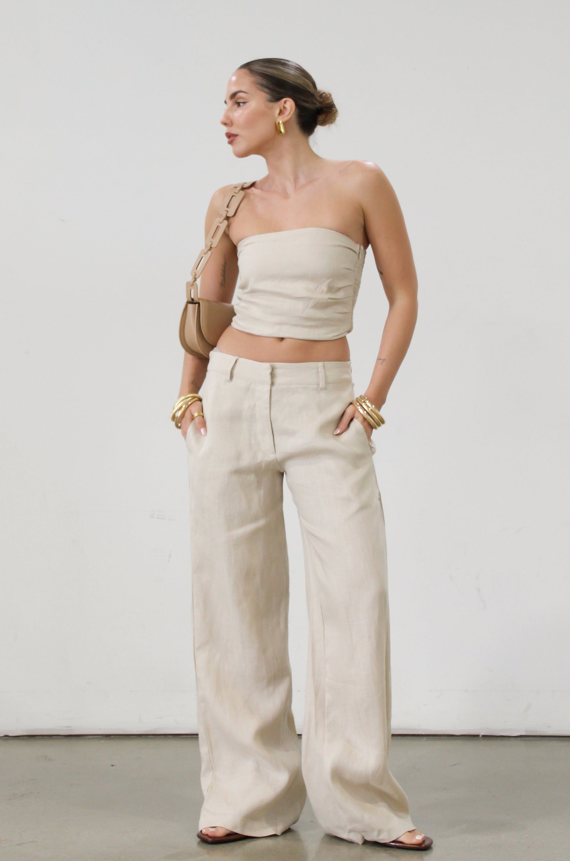 Woven wide leg pants. Hook and eye and zipper fly. Side pockets. Unlined.  tan linen pants. linen pants. everyday throw on pants. business causal pants. vacation set. vacation outfit.