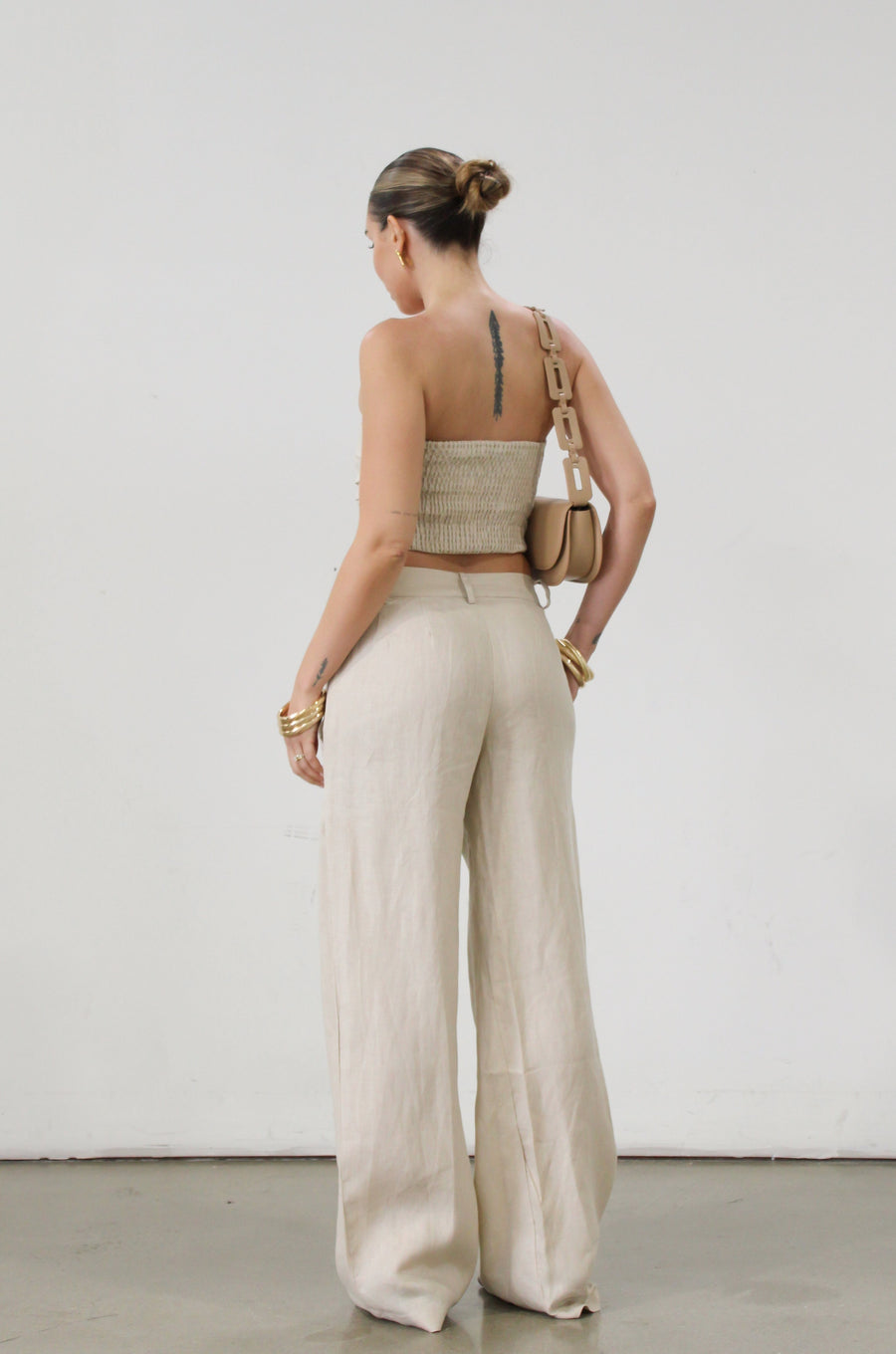 Woven wide leg pants. Hook and eye and zipper fly. Side pockets. Unlined.  tan linen pants. linen pants. everyday throw on pants. business causal pants. vacation set. vacation outfit.
