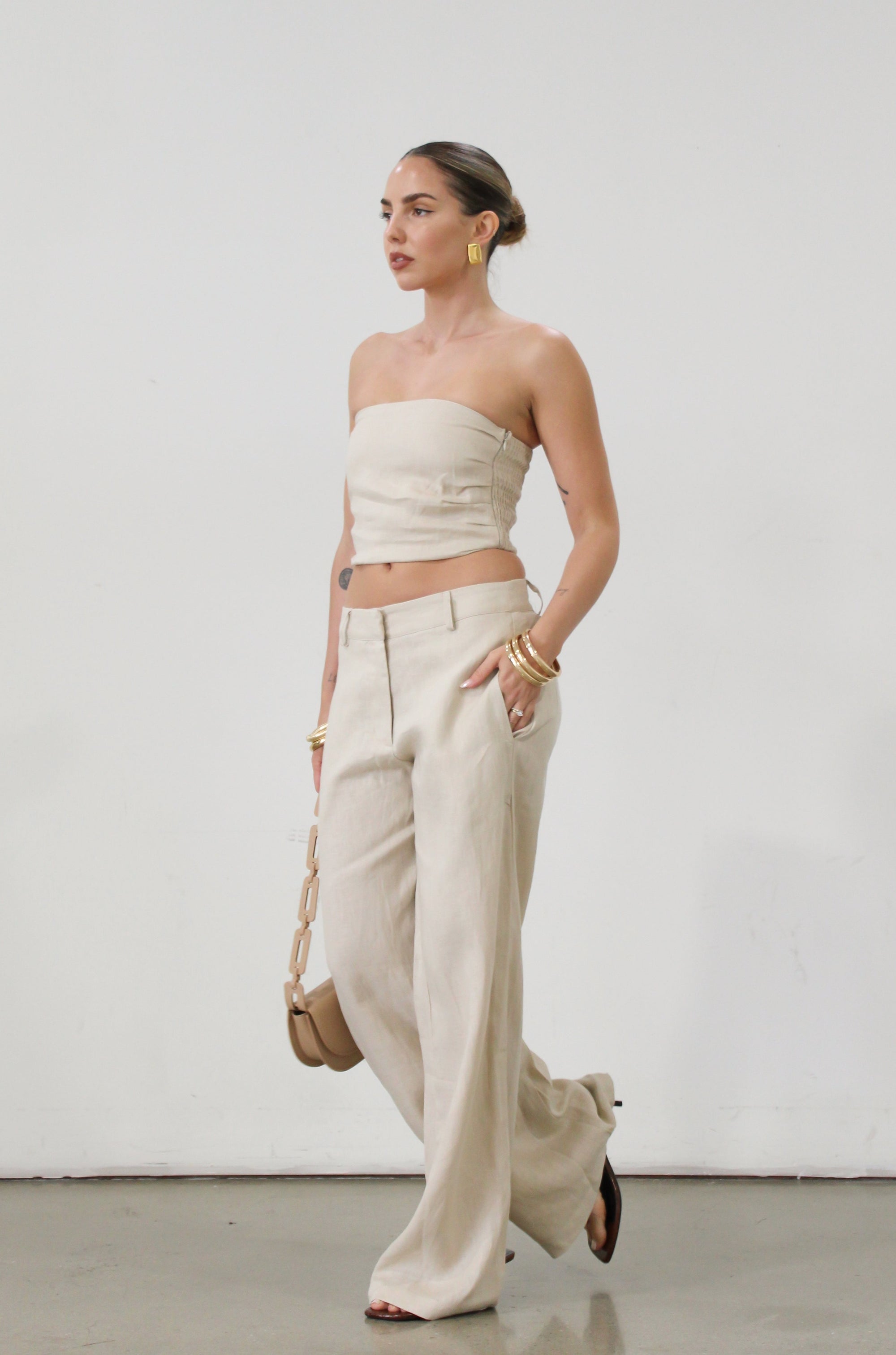 Woven wide leg pants. Hook and eye and zipper fly. Side pockets. Unlined.  tan linen pants. linen pants. everyday throw on pants. business causal pants. vacation set. vacation outfit.