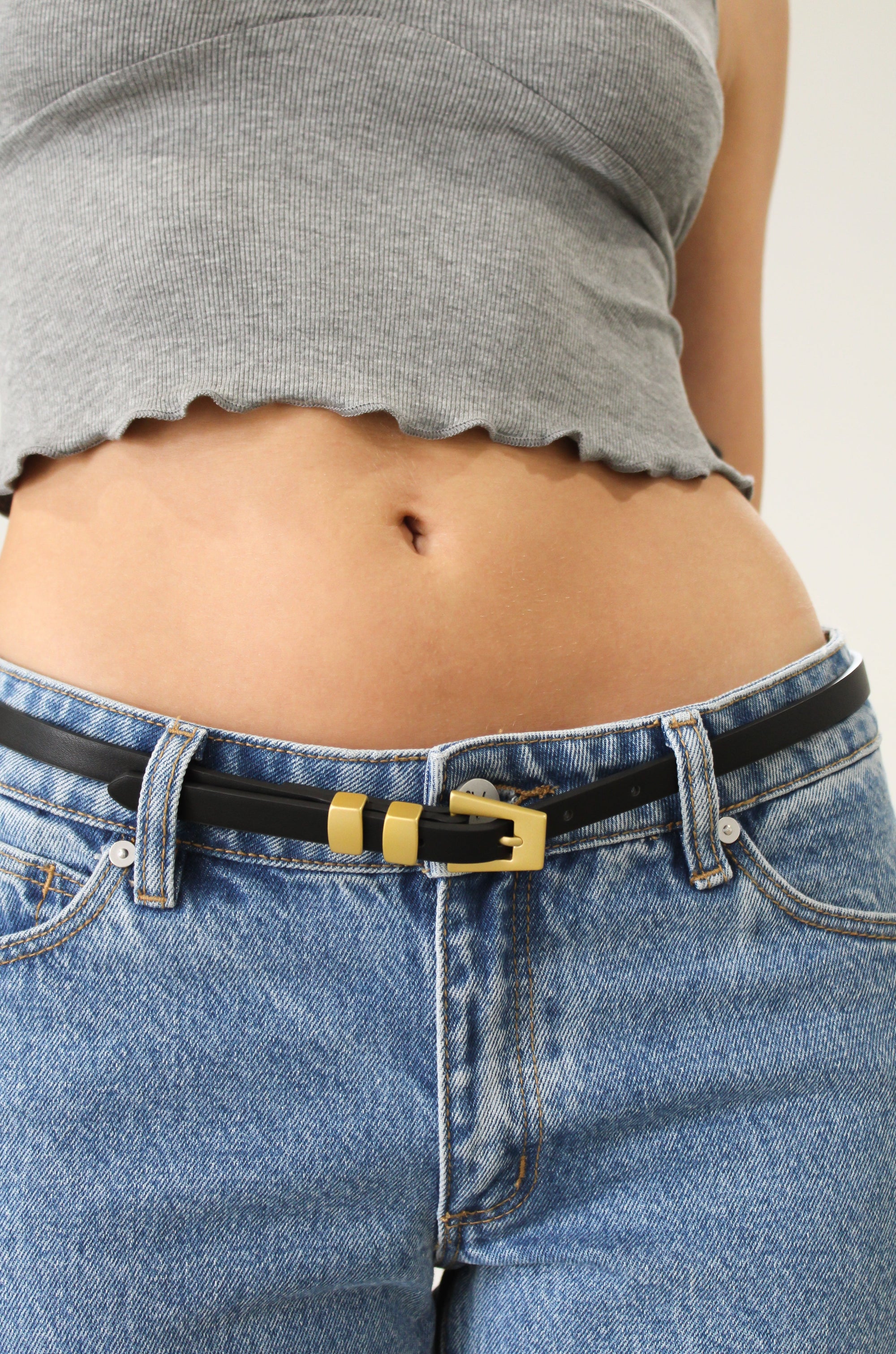 Thin leather belt. Square buckle. Adjustable