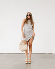 Striped knit dress. Sleeveless. Racerback. Unlined. Black and white.