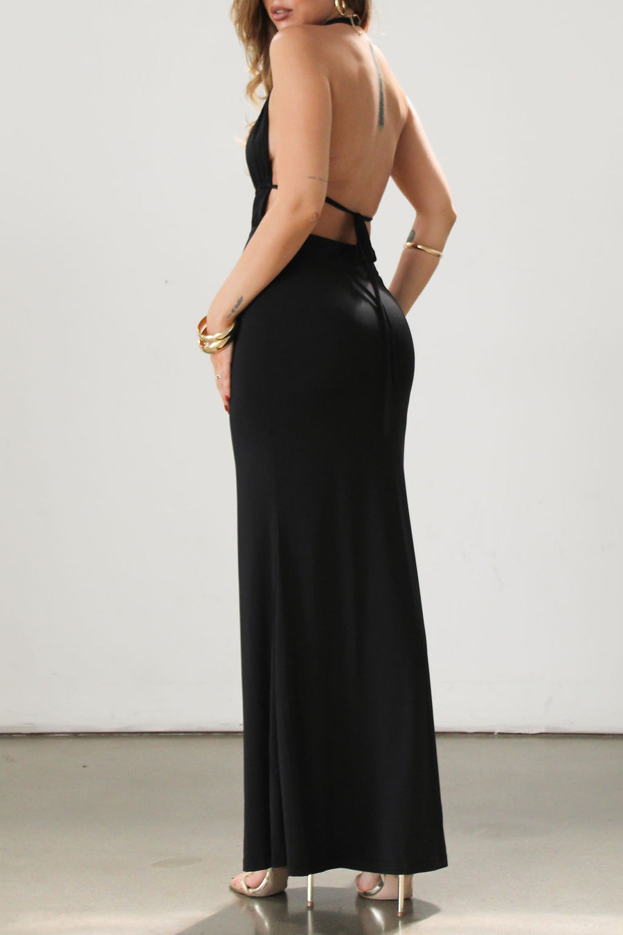 Knit maxi dress. Halter neckline. Back tie closure. Elastic back. Fully lined. Open back dress. Deep v dress. Black dress. Guest wedding dress.