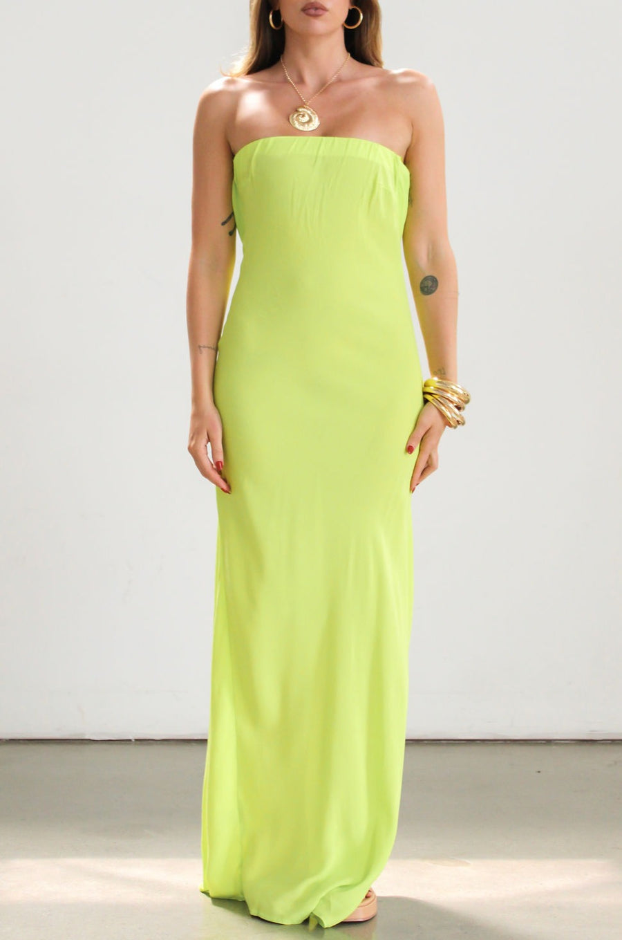 Strapless woven maxi dress. Elastic neckline. Back S-hook closure. Back cut out. Unlined. Neon green dress. Summer dress. Open back dress