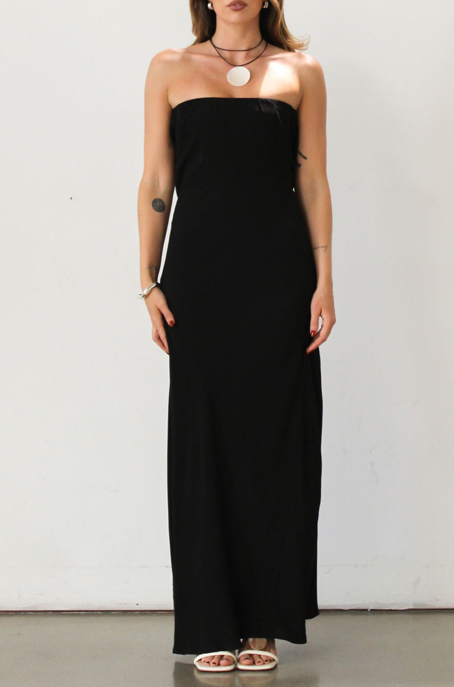 Strapless woven maxi dress. Elastic neckline. Back S-hook closure. Back cut out. Unlined. Guest wedding dress. Black tie dress. Black dress. Open back.