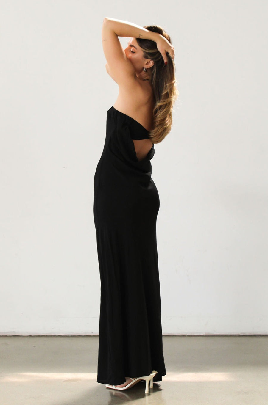 Strapless woven maxi dress. Elastic neckline. Back S-hook closure. Back cut out. Unlined. Guest wedding dress. Black tie dress. Black dress. Open back.