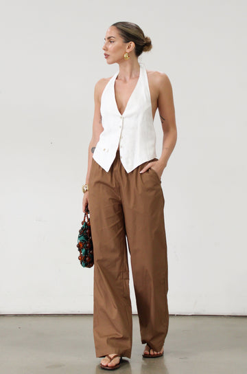 Woven pants. Elastic waistband. Side pockets. Unlined. Brown throw on pants. Cute casual pants. 