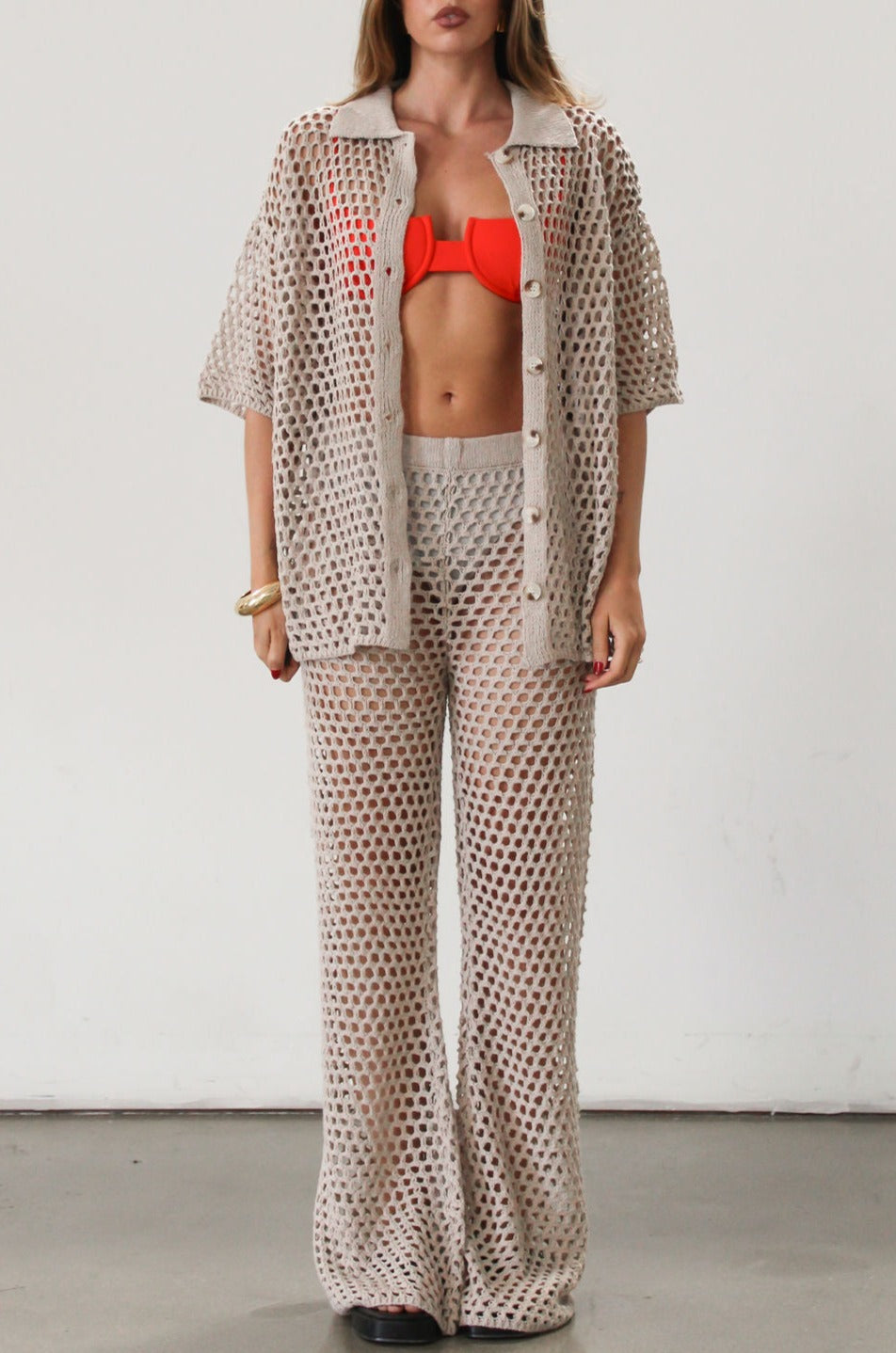 Open knit crochet pants. Elastic waistband. Unlined/sheer. Beach coverup. Pool coverup. Tan oat bottoms