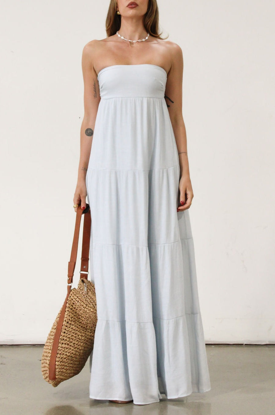 Crinkle woven maxi dress. Strapless neckline. Back tie closure. Elastic back waist. Fully lined. Baby blue maxi dress. Summer dress.