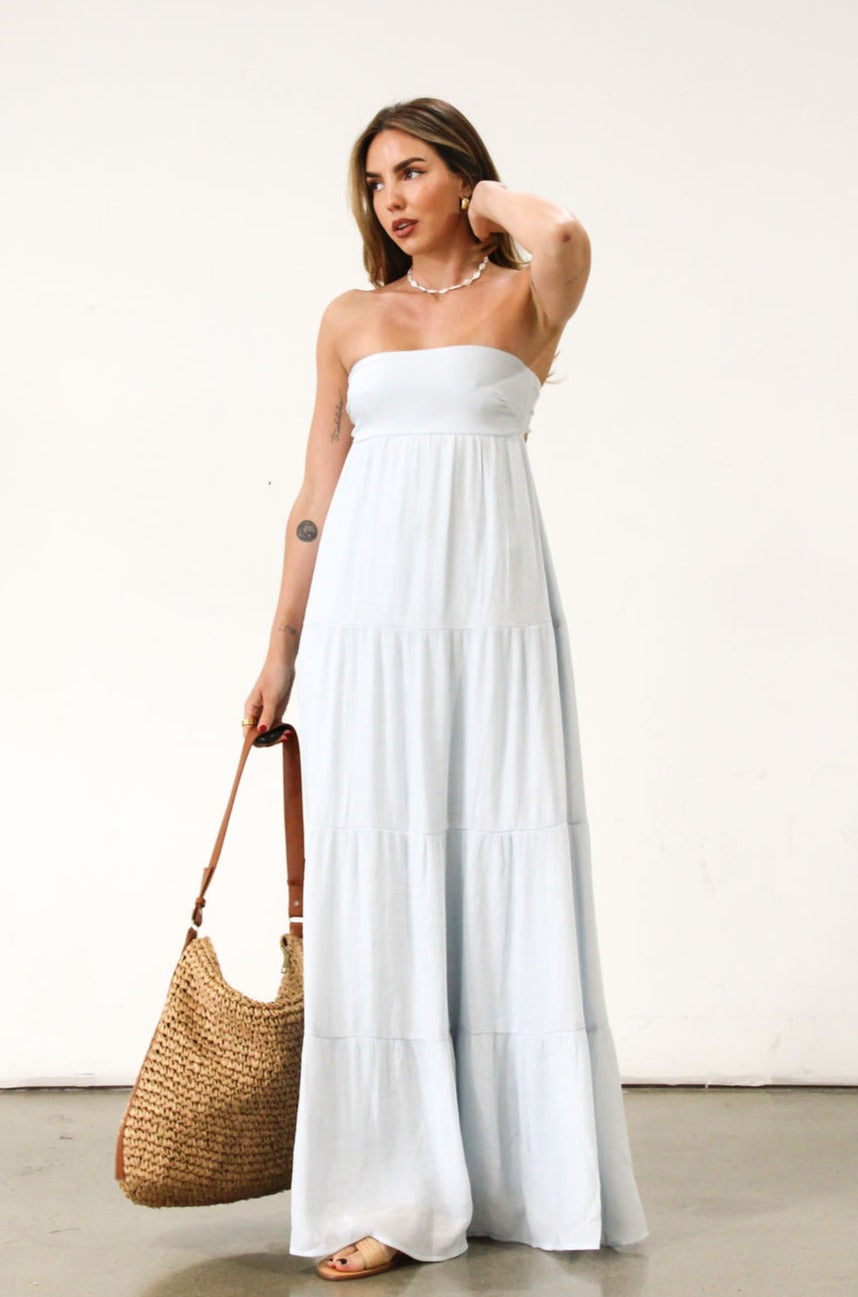 Crinkle woven maxi dress. Strapless neckline. Back tie closure. Elastic back waist. Fully lined. Baby blue maxi dress. Summer dress.