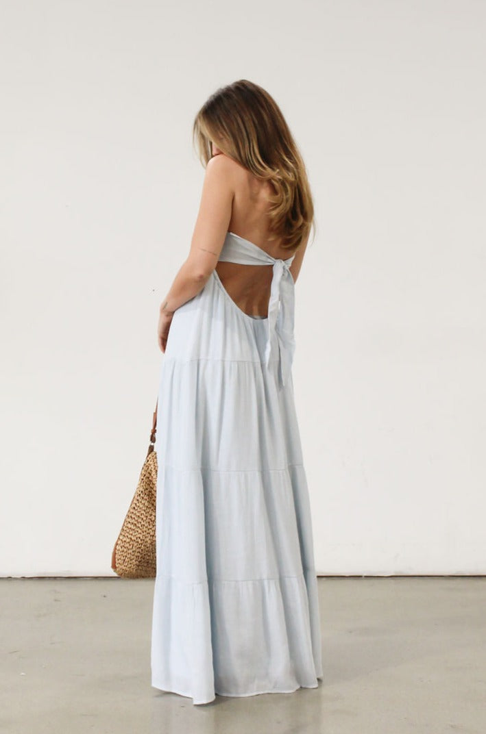 Crinkle woven maxi dress. Strapless neckline. Back tie closure. Elastic back waist. Fully lined. Baby blue maxi dress. Summer dress.