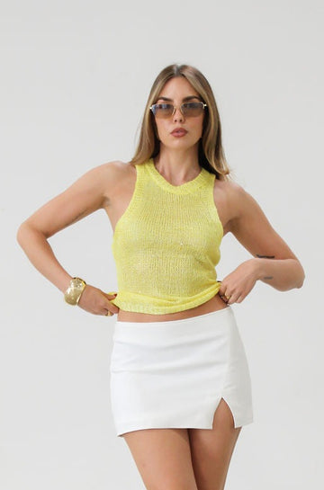Woven mini skirt. Side hook and eye and zipper closures. Front slit. Fully lined. White mini skirt. Going out skirt. Summer outfit
