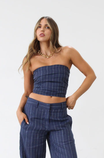 Striped woven top. Strapless side zipper closure. Elastic smocked back. Fully lined. Blue stripe tube top. Summer top. Tops to wear in summer. Tops to wear on vacation