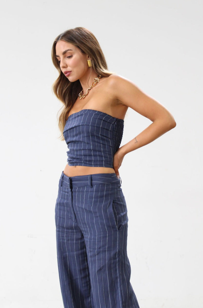 Striped woven top. Strapless side zipper closure. Elastic smocked back. Fully lined. Blue stripe tube top. Summer top. Tops to wear in summer. Tops to wear on vacation