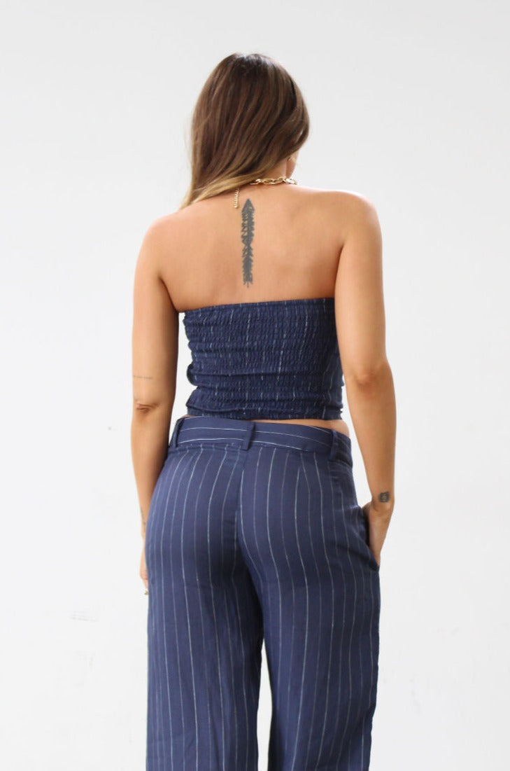 Striped woven top. Strapless side zipper closure. Elastic smocked back. Fully lined. Blue stripe tube top. Summer top. Tops to wear in summer. Tops to wear on vacation