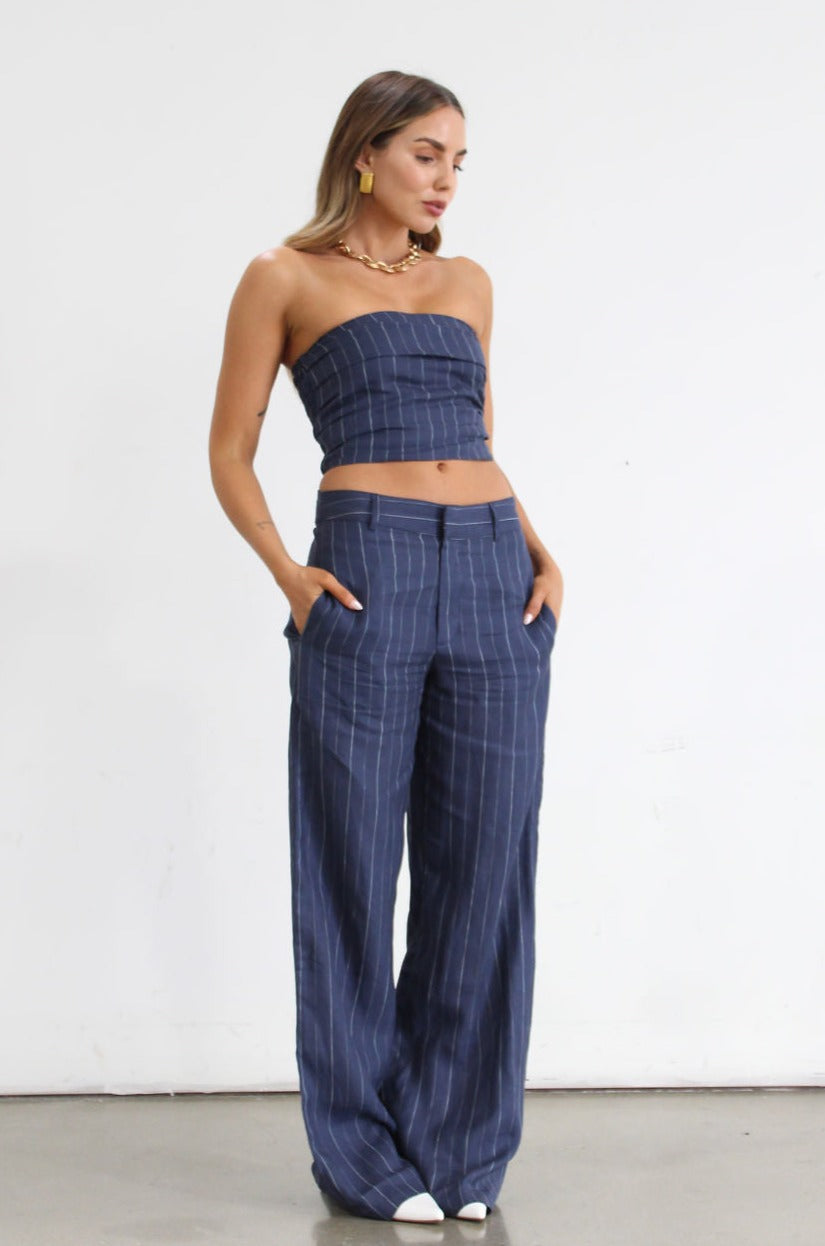 Striped woven top. Strapless side zipper closure. Elastic smocked back. Fully lined. Blue stripe tube top. Summer top. Tops to wear in summer. Tops to wear on vacation