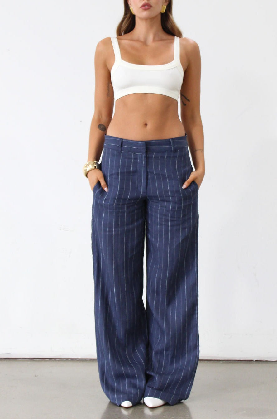 Striped woven wide leg pants. Hook and eye and zipper fly. Side pockets. Unlined. Business casual work pants. Slacks. Blue pants. blue slacks. blue stripe work pants.
