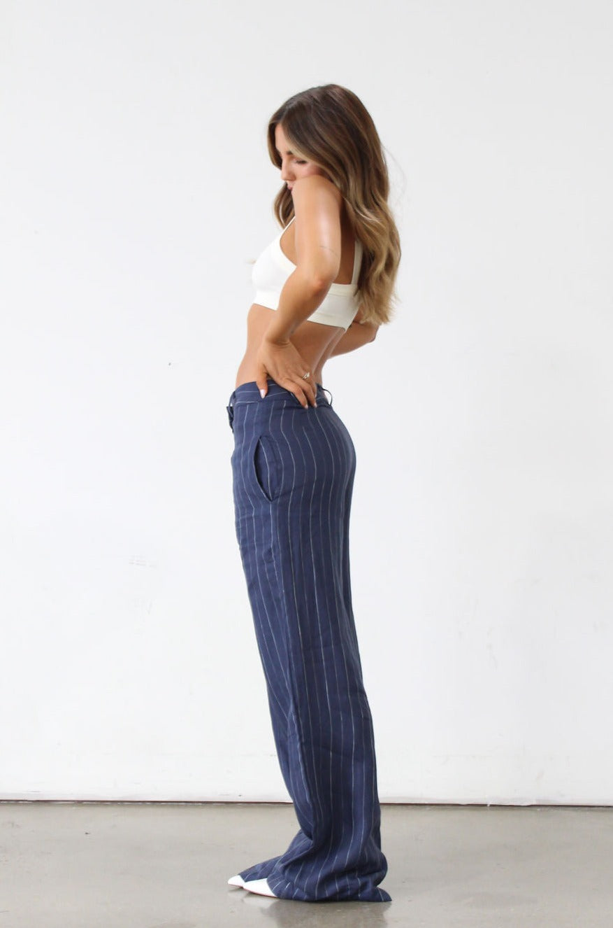 Striped woven wide leg pants. Hook and eye and zipper fly. Side pockets. Unlined. Business casual work pants. Slacks. Blue pants. blue slacks. blue stripe work pants.