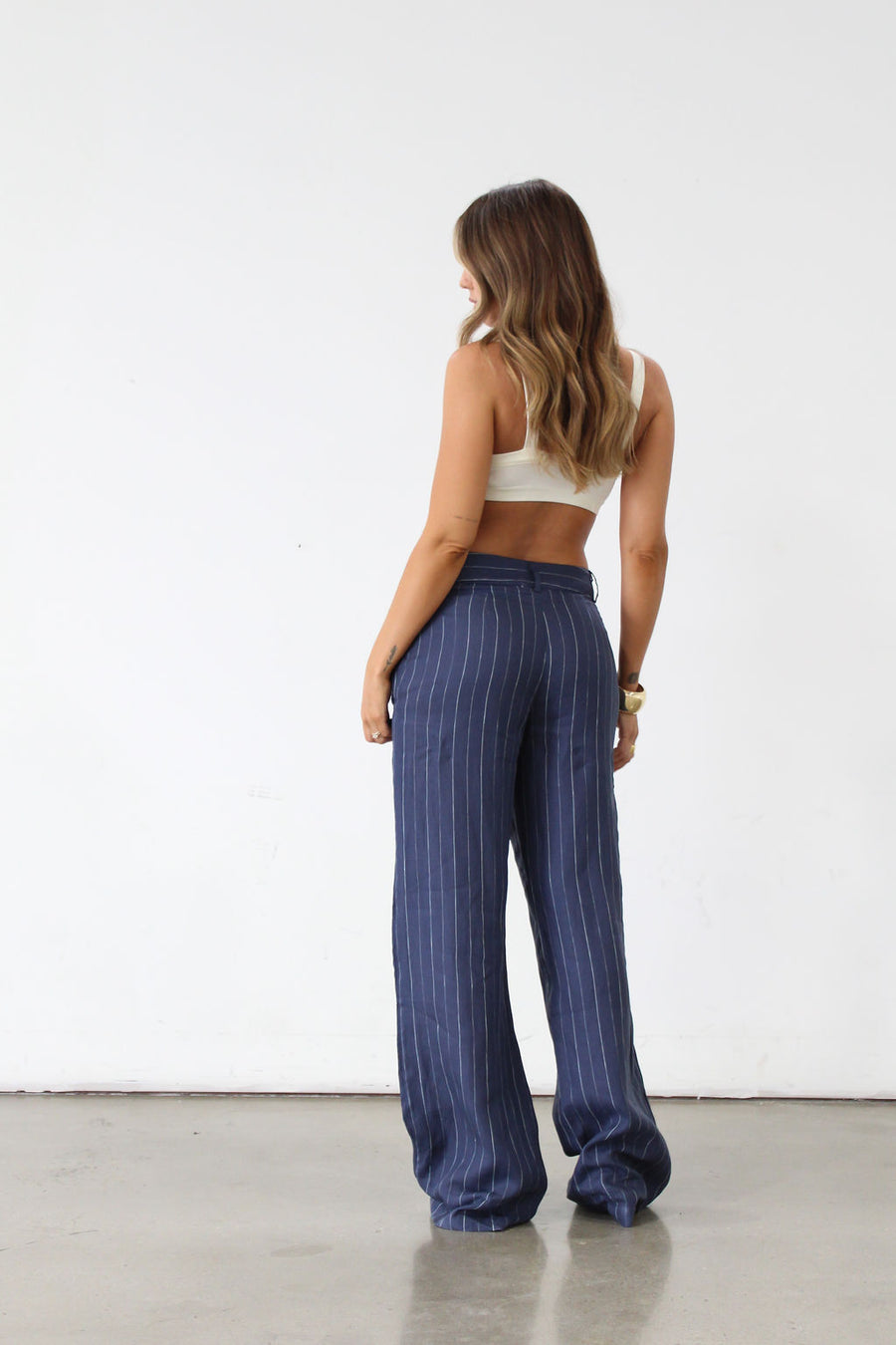 Striped woven wide leg pants. Hook and eye and zipper fly. Side pockets. Unlined. Business casual work pants. Slacks. Blue pants. blue slacks. blue stripe work pants.