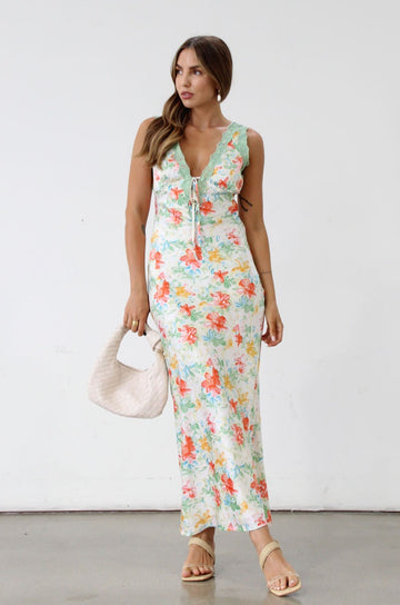 Floral printed satin maxi dress. Sleeveless. Front tie closure. Lace trim. Side zipper closure. Fully lined. Wedding dress. Guest wedding dress. Floral maxi dress. Dress for summer. Dress for vacation