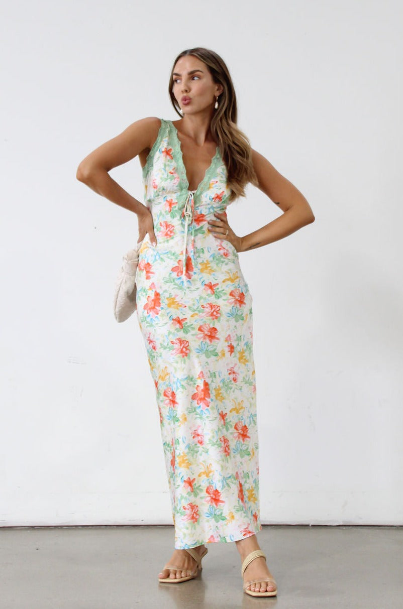 Floral printed satin maxi dress. Sleeveless. Front tie closure. Lace trim. Side zipper closure. Fully lined. Wedding dress. Guest wedding dress. Floral maxi dress. Dress for summer. Dress for vacation