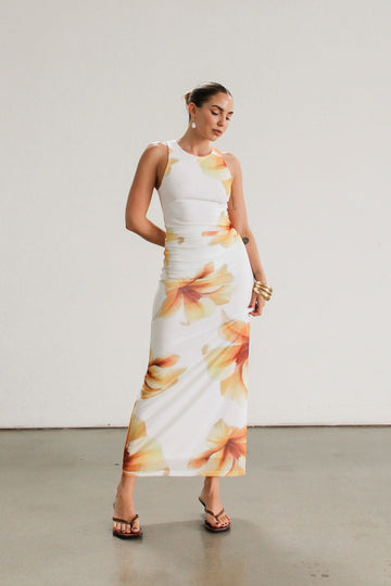 Floral knit mesh maxi dress. Sleeveless. Ruched sides. Fully lined.