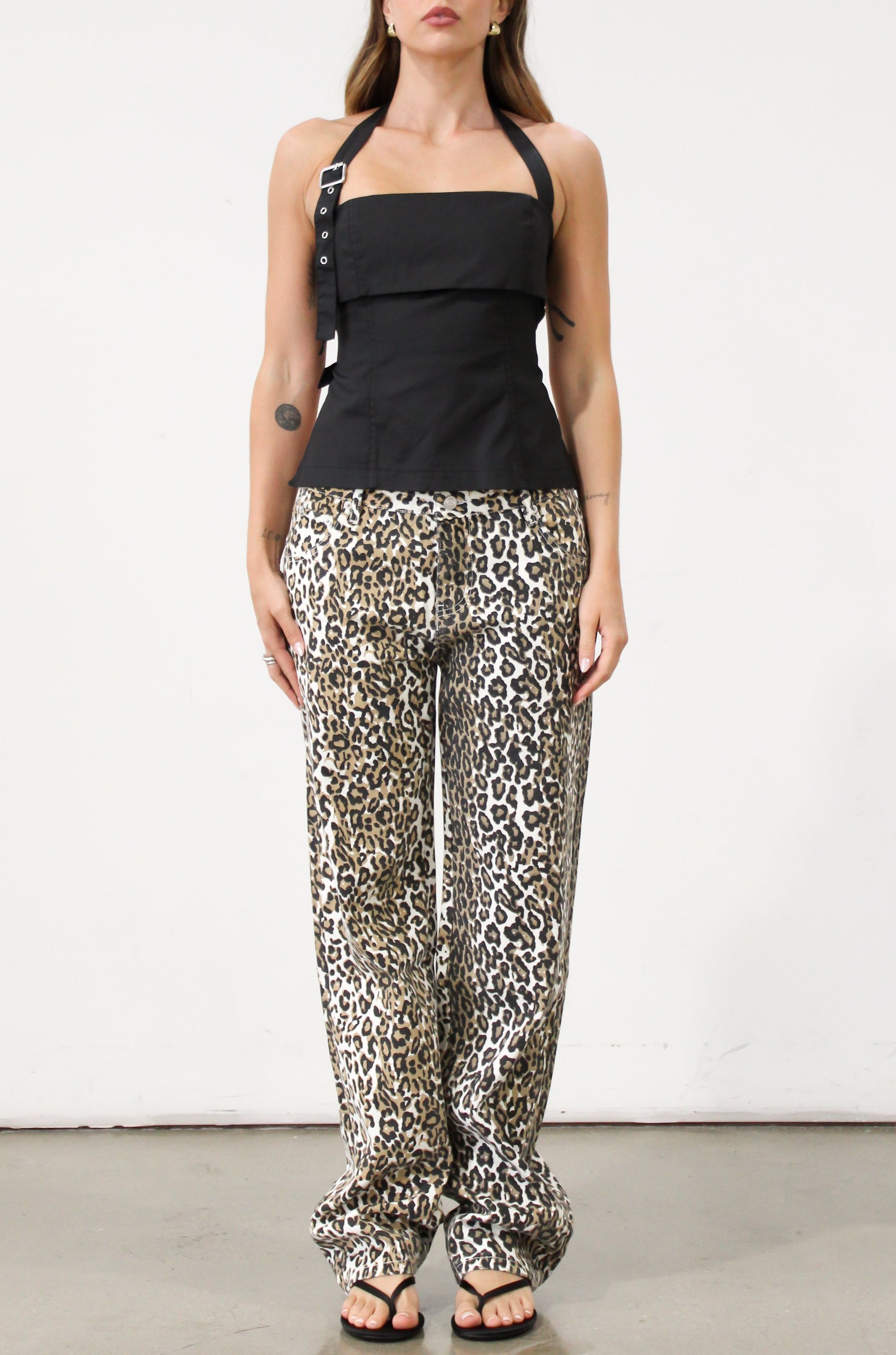 Printed jeans. Button and zipper fly. Five pocket construction. Unlined. cheetah pants. cheetah jeans. leopard jeans. leopard pants