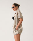 TOP: Striped textured shirt. Collar neckline. Short sleeves. Front button down closure. Unlined.&nbsp;   BOTTOM: Striped textured shorts. Elastic waist with drawstring closure. Side pockets. Fully lined.