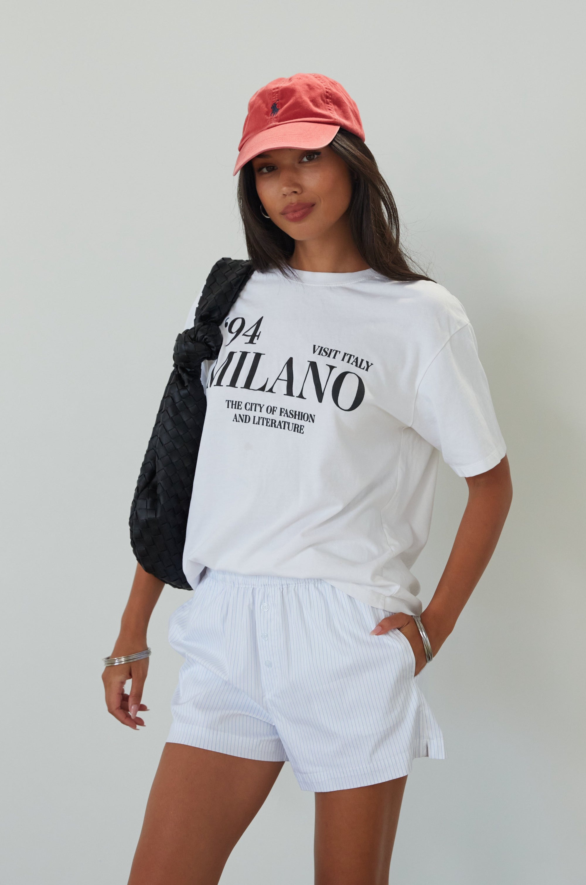Striped woven shorts. Elastic waistband. Faux front button fly. Side pockets. Fully lined. boxer shorts. cute casual outfit. summer outfit. summer shorts. white and blue boxer shorts. striped boxer shorts