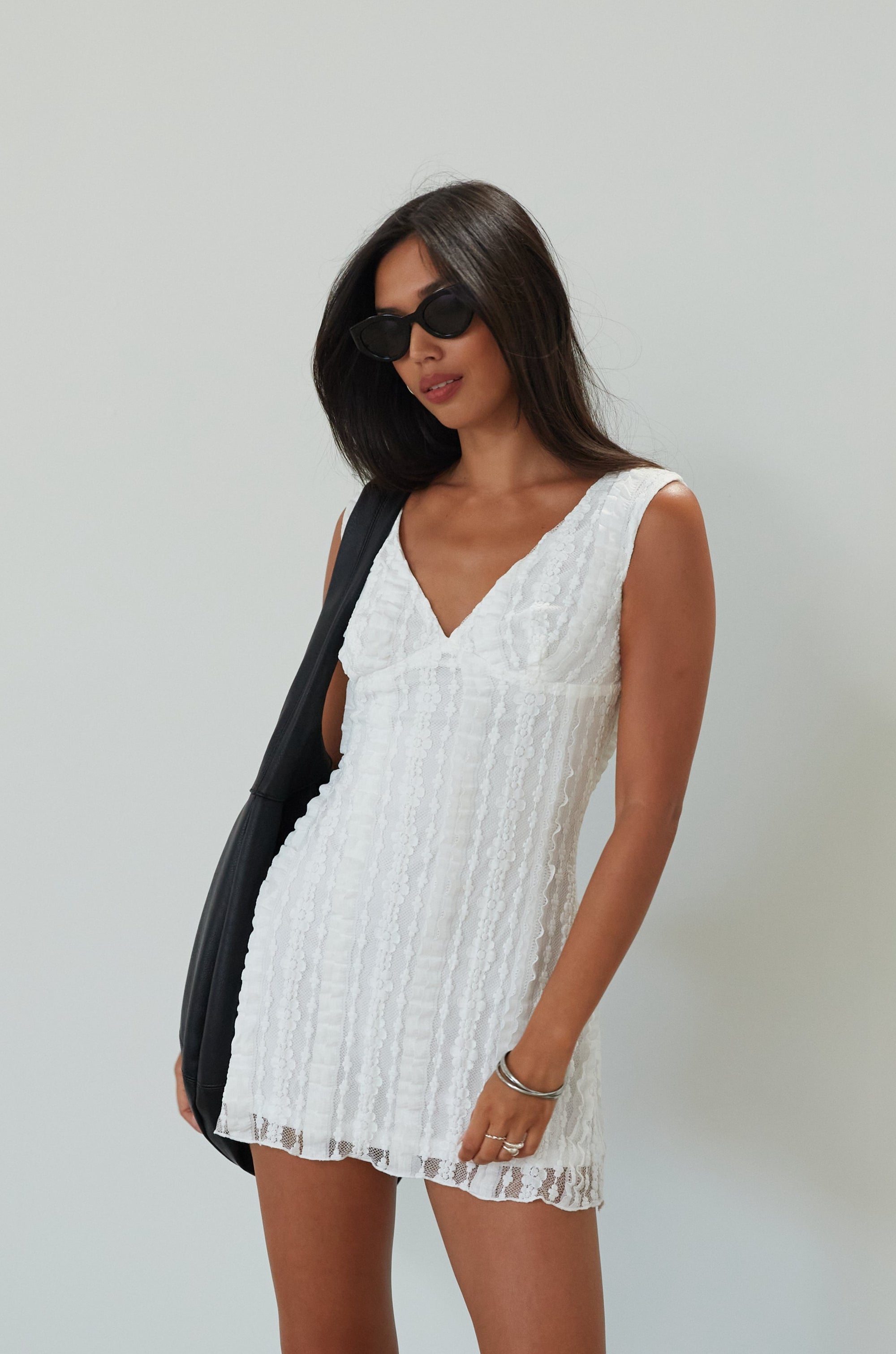 Knit lace sleeveless dress. Back hook and eye and zipper closures. Fully lined. white mini dress. white lace mini dress. engagement dress. bridal shower dress. bridal dress. summer dress