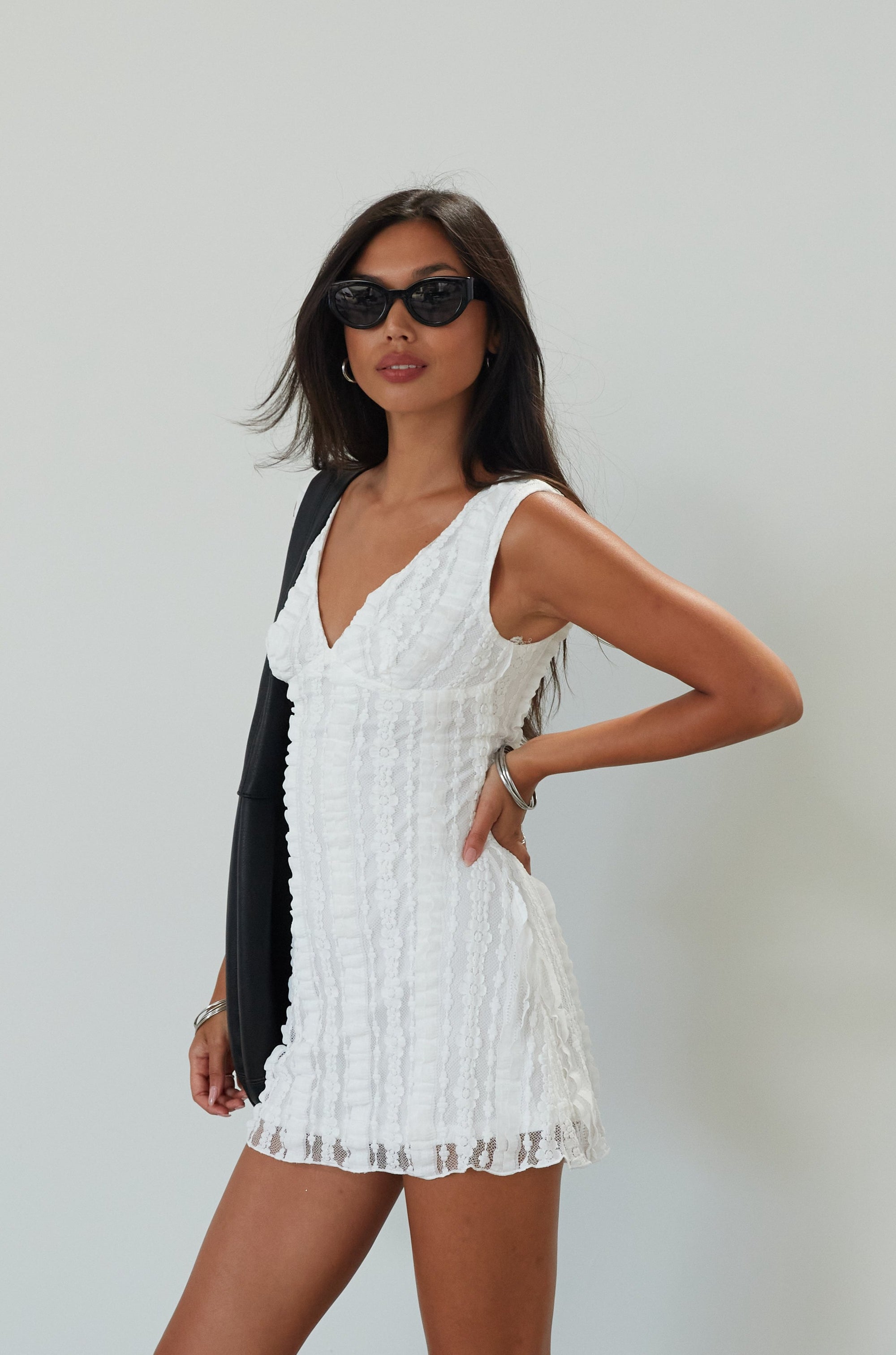 Knit lace sleeveless dress. Back hook and eye and zipper closures. Fully lined. white mini dress. white lace mini dress. engagement dress. bridal shower dress. bridal dress. summer dress