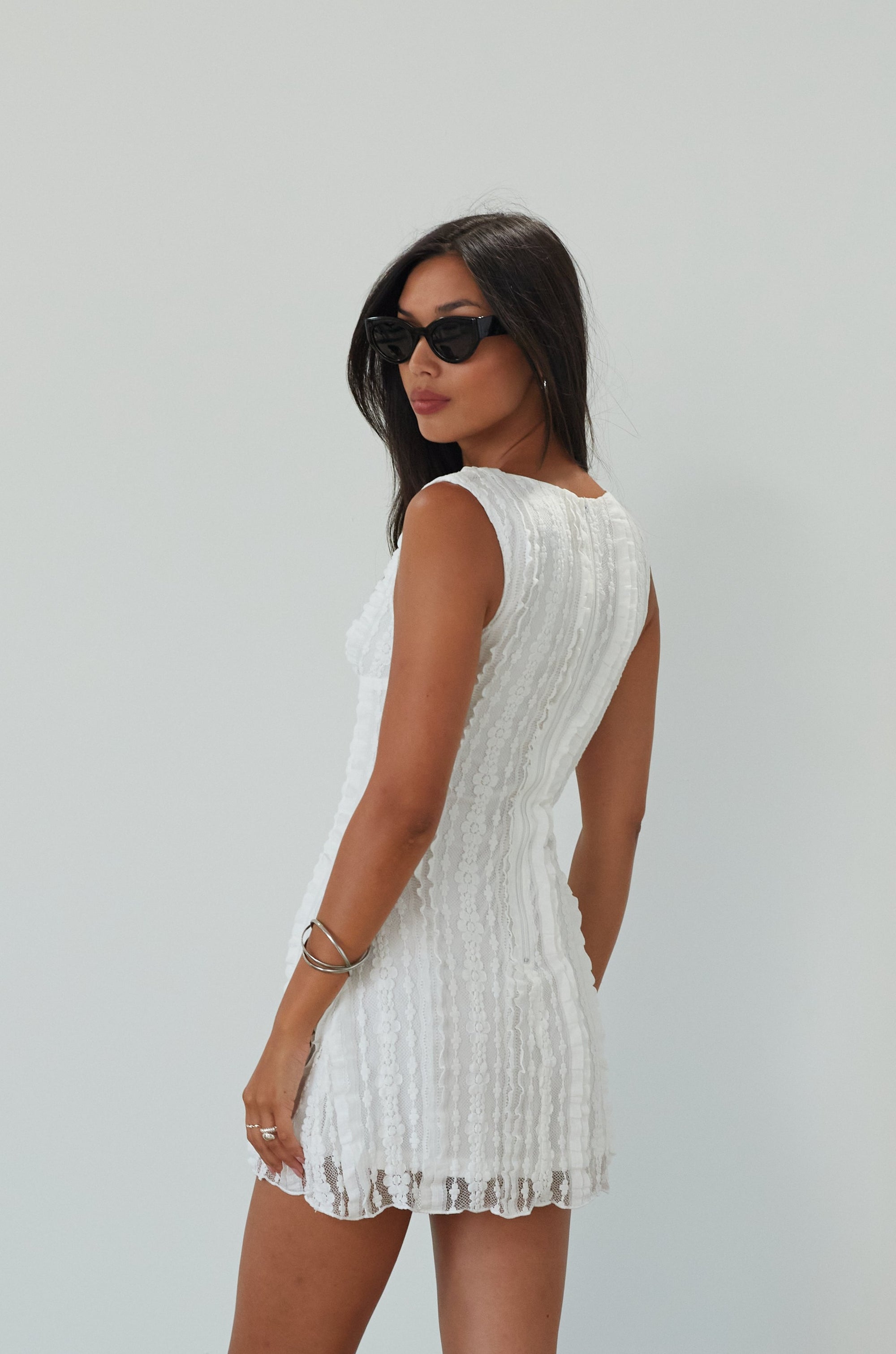 Knit lace sleeveless dress. Back hook and eye and zipper closures. Fully lined. white mini dress. white lace mini dress. engagement dress. bridal shower dress. bridal dress. summer dress