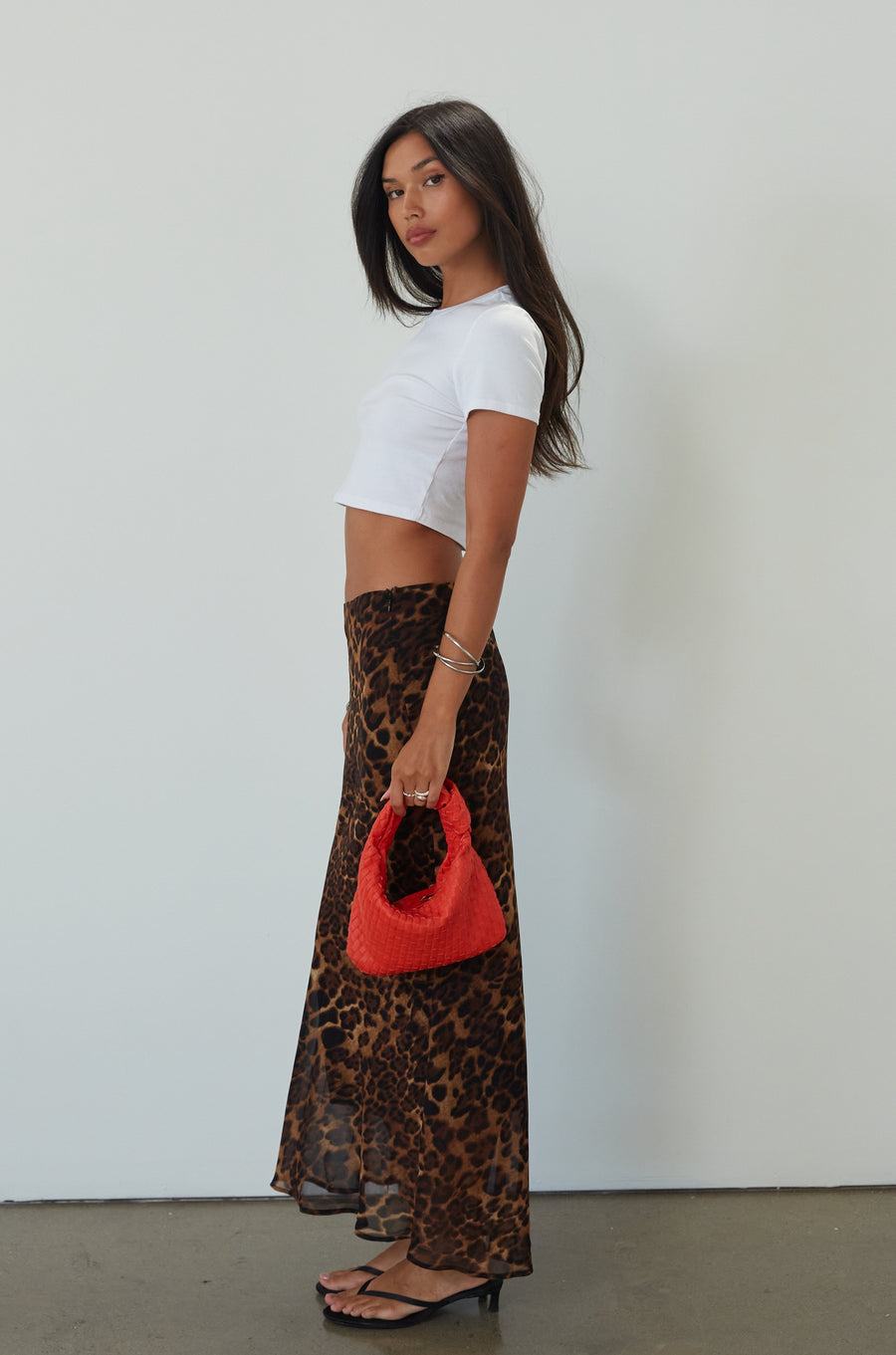 Animal printed chiffon maxi skirt. Side hook and eye and zipper closures. Fully lined. leopard maxi skirt. going out skirt. going out outfit. date night outfit. date night skirt. vacation outfit.