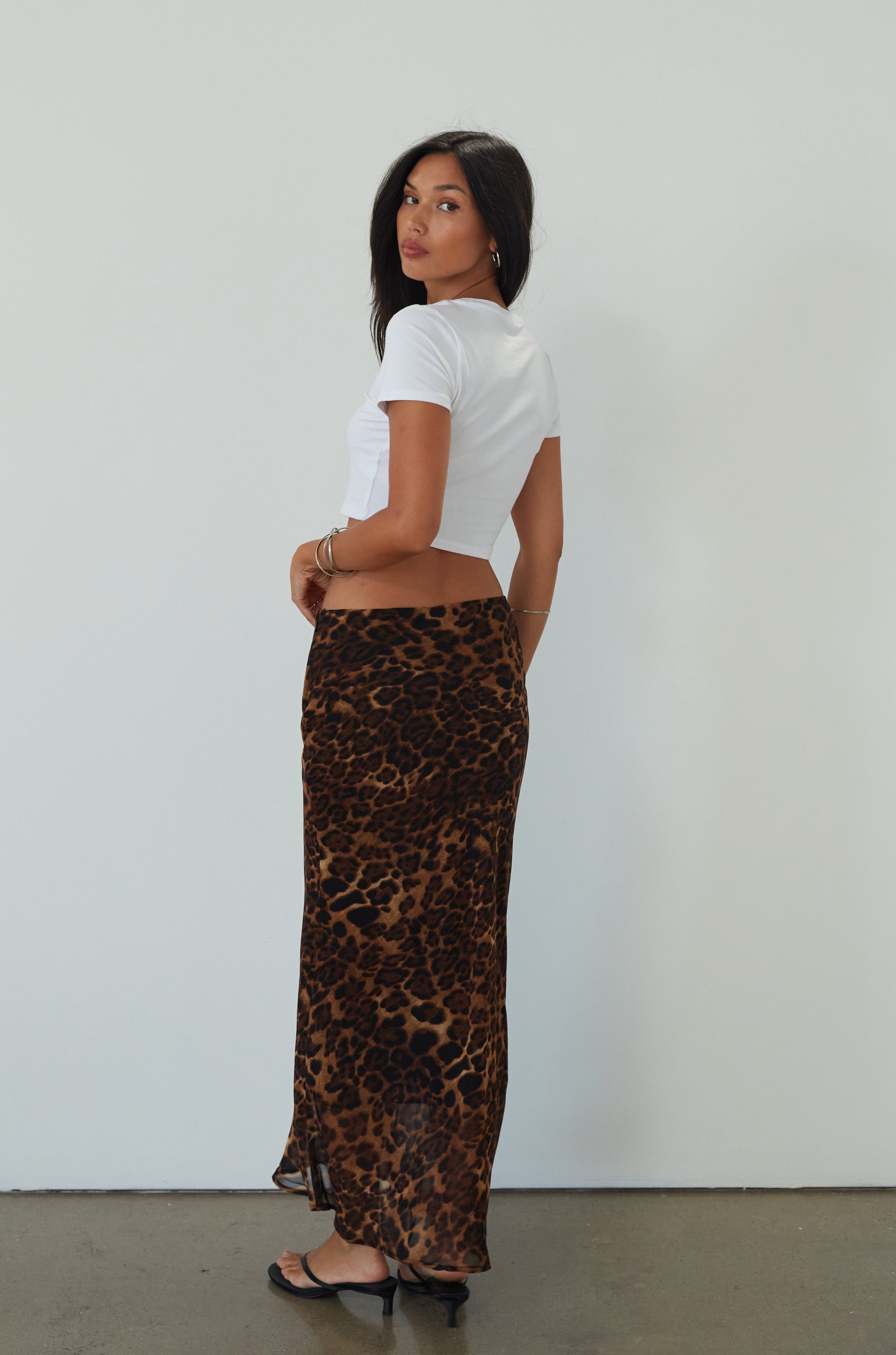 Animal printed chiffon maxi skirt. Side hook and eye and zipper closures. Fully lined. leopard maxi skirt. going out skirt. going out outfit. date night outfit. date night skirt. vacation outfit.