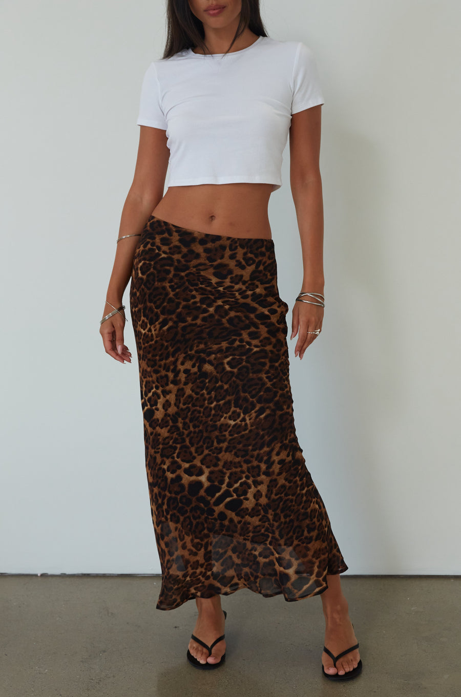 Animal printed chiffon maxi skirt. Side hook and eye and zipper closures. Fully lined. leopard maxi skirt. going out skirt. going out outfit. date night outfit. date night skirt. vacation outfit.