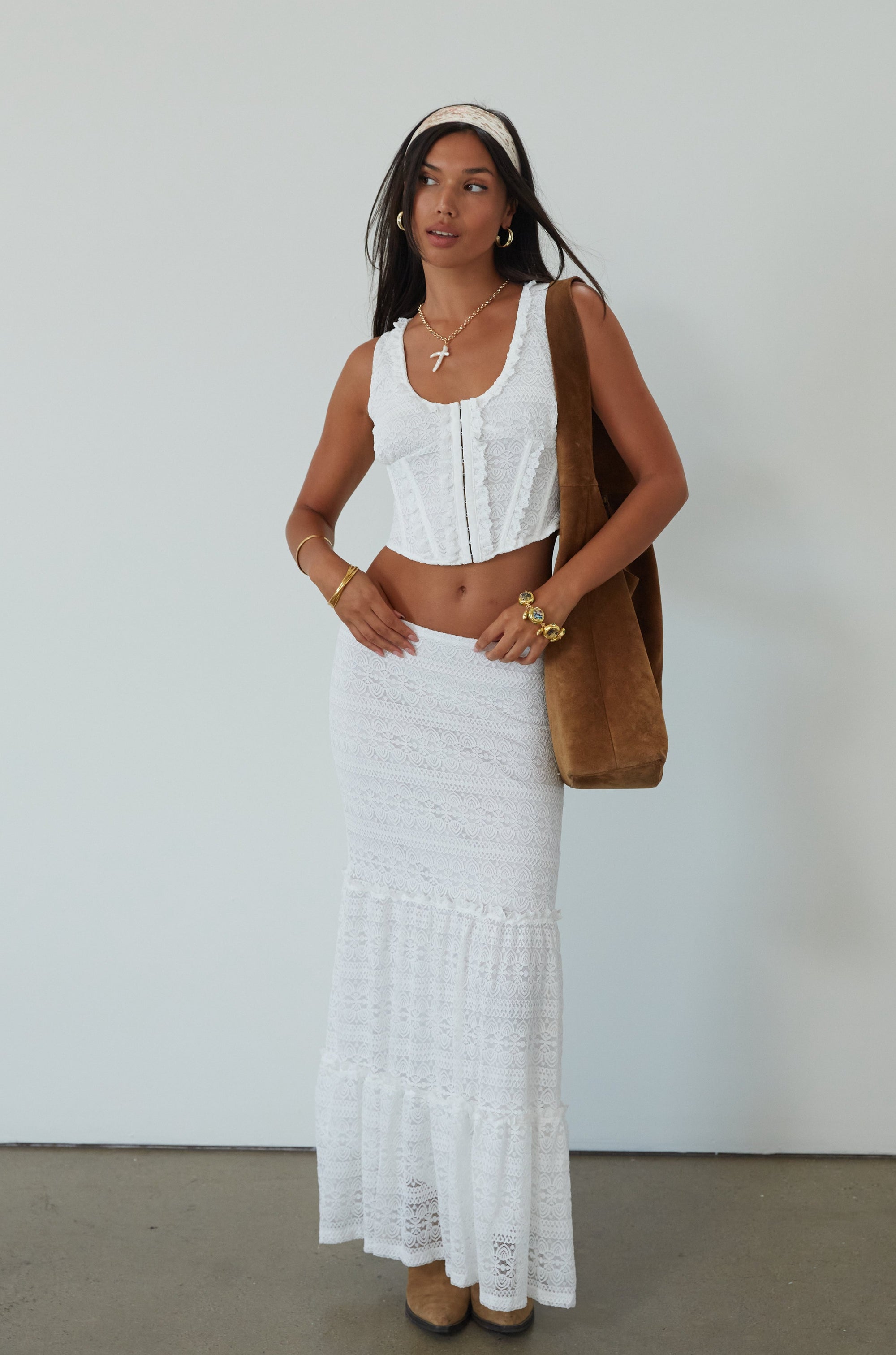 Lace sleeveless top. Boning in bodice. Front hook and eye closures. Fully lined. Knit lace maxi skirt. Elastic waistband. Fully lined. maxi skirt set. lace set. lace maxi skirt set. bridal shower set. bridal shower outfit. vacation set. vacation outfit. summer outfit. summer set