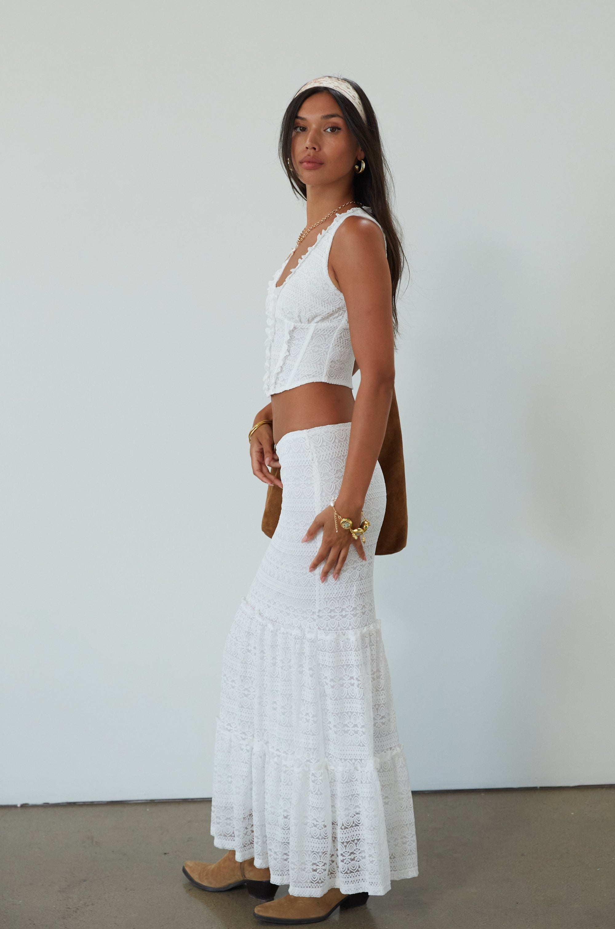 Lace sleeveless top. Boning in bodice. Front hook and eye closures. Fully lined. Knit lace maxi skirt. Elastic waistband. Fully lined. maxi skirt set. lace set. lace maxi skirt set. bridal shower set. bridal shower outfit. vacation set. vacation outfit. summer outfit. summer set