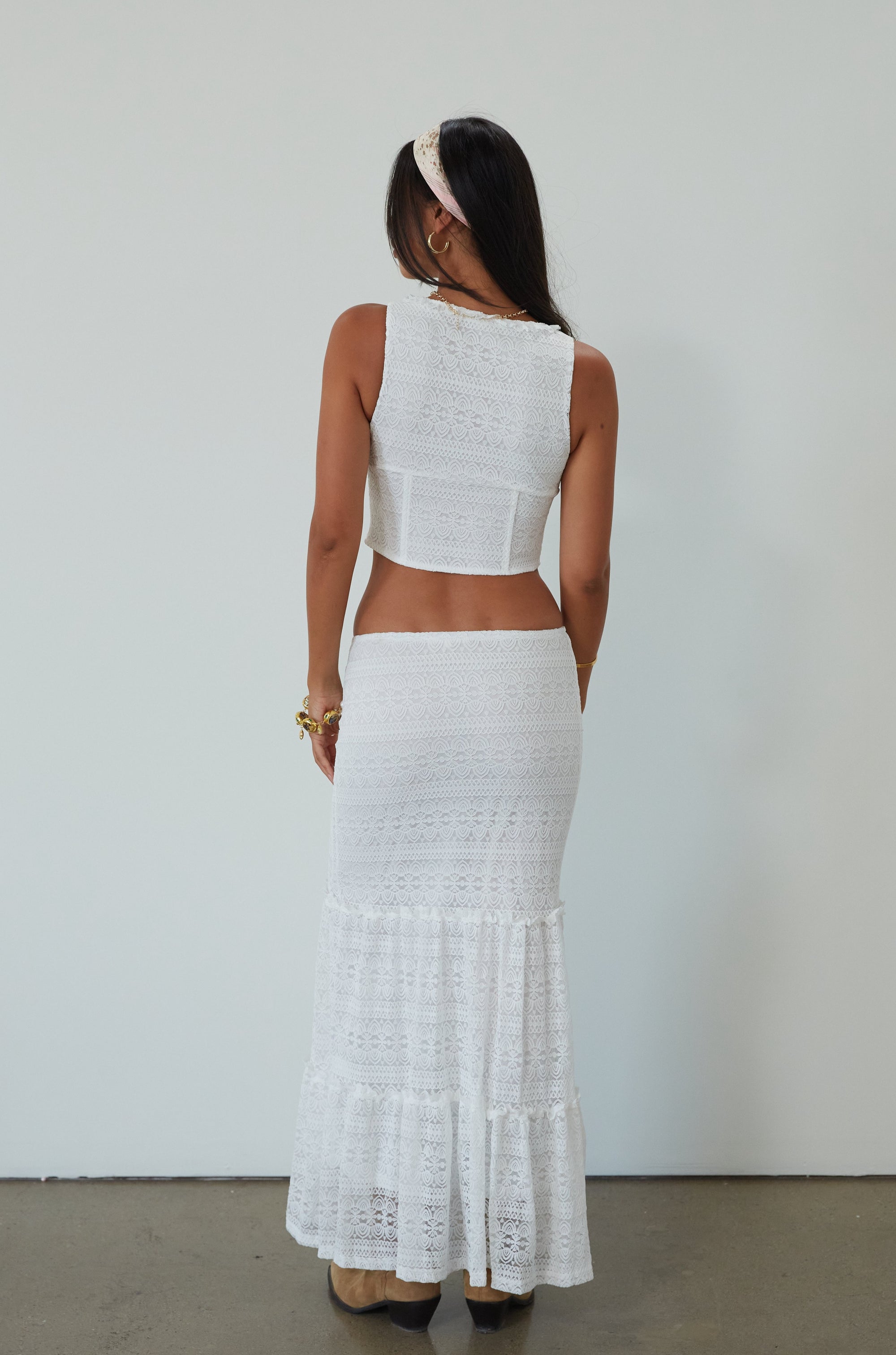 Lace sleeveless top. Boning in bodice. Front hook and eye closures. Fully lined. Knit lace maxi skirt. Elastic waistband. Fully lined. maxi skirt set. lace set. lace maxi skirt set. bridal shower set. bridal shower outfit. vacation set. vacation outfit. summer outfit. summer set