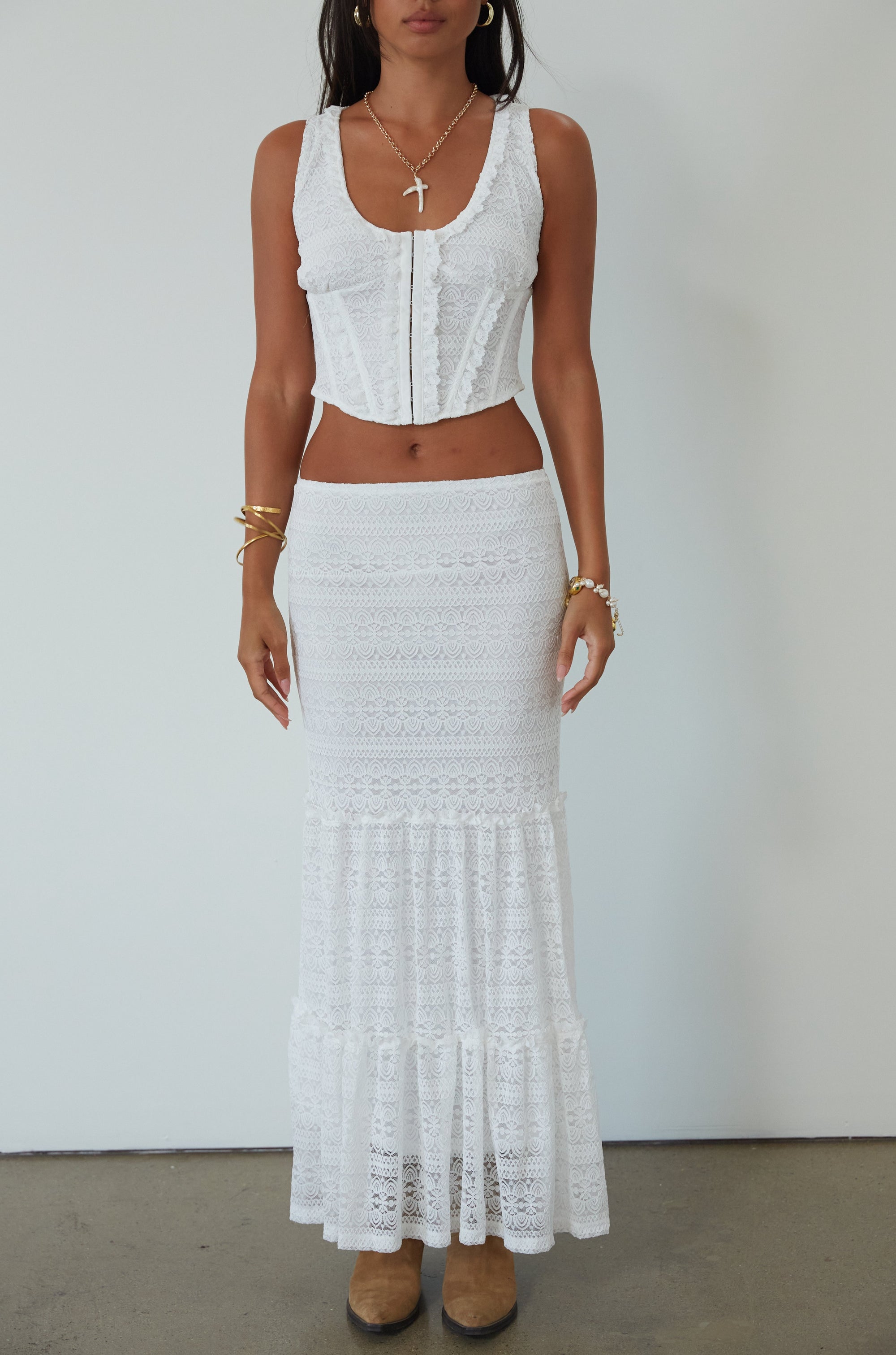 Lace sleeveless top. Boning in bodice. Front hook and eye closures. Fully lined. Knit lace maxi skirt. Elastic waistband. Fully lined. maxi skirt set. lace set. lace maxi skirt set. bridal shower set. bridal shower outfit. vacation set. vacation outfit. summer outfit. summer set