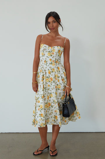 Floral printed woven midi dress. Adjustable straps. Underwire cups. Side pockets. Back hook and eye and zipper closures. Fully lined. floral midi dress. summer dress. summer midi dress. 